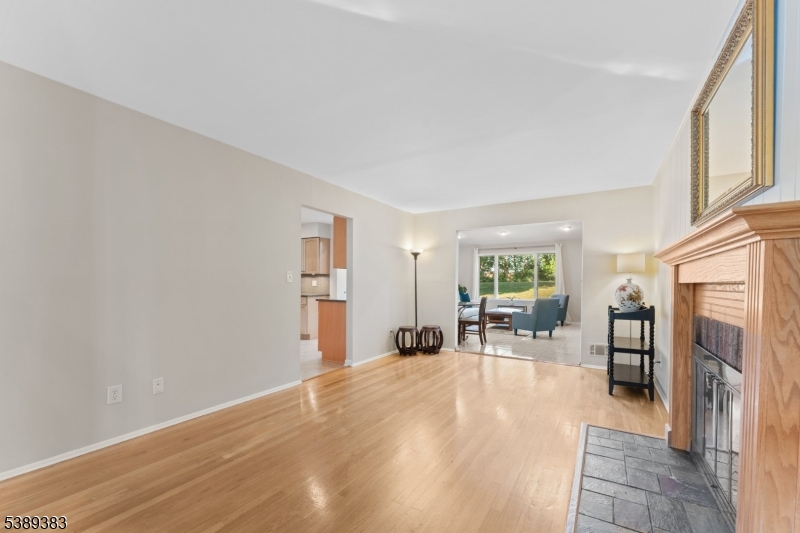 Den Den open to the kitchen and family room.