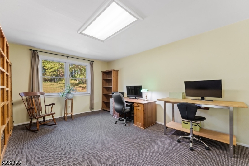 Office Dedicated office space with wall to wall carpet.