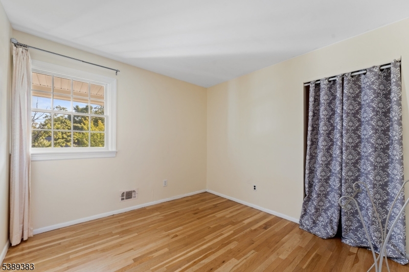 Bedroom 3 Bedroom 3 with hardwood floor.