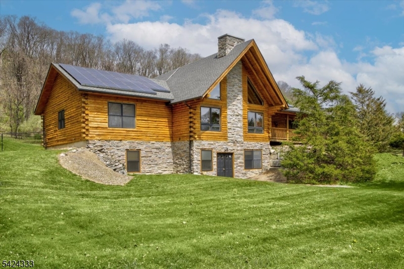 Private setting on almost 6 acres in both Green and Fredon Townships