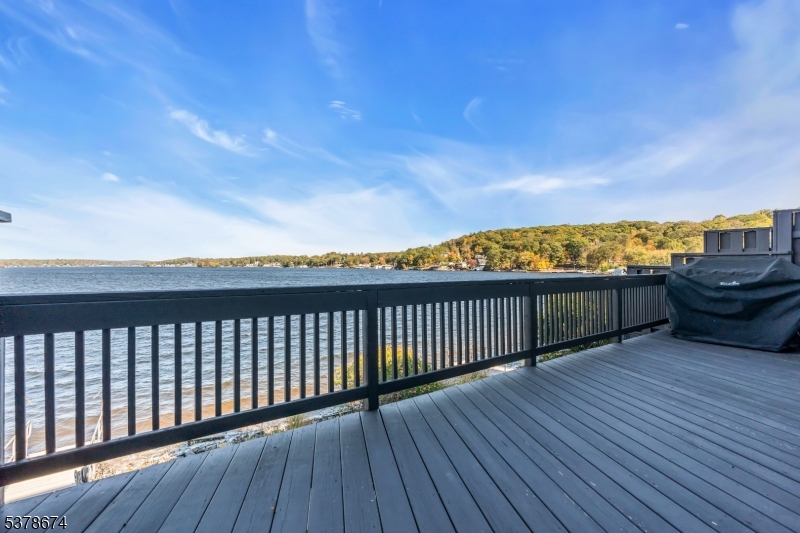 Main floor deck Lakefront deck with built-in gas line for grill. Take you morning coffee here or enjoy you dinner overlooking the lake.