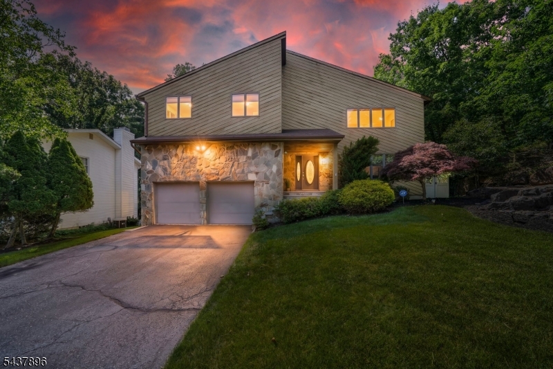 This distinguished colonial residence with a sophisticated contemporary sensibility delivers 3,475 square feet of thoughtfully curated living space-effortlessly balancing everyday comfort with the art of entertaining.