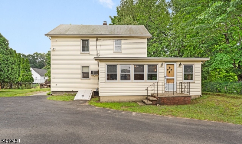 Front 3 BR colonial with wrap around enclosed porch on private flag lot