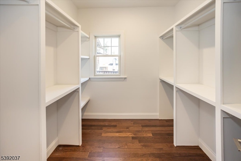 Walk In Closet  Primary Bedrm 8x8 Sized Walk In Closet with Custom Closet Organizers