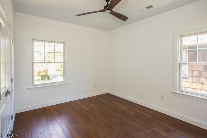 Bed 2 Harwood Floors and Ceiling Fans
