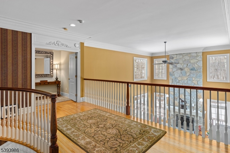 Upstairs Landing Overlooks Great Room and Entrance Foyer
