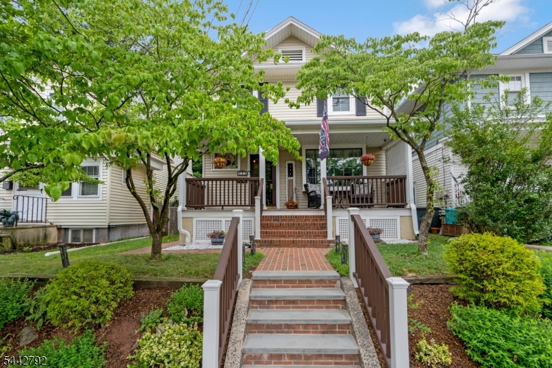 CHARMING COLONIAL welcoming rocking chair front porch