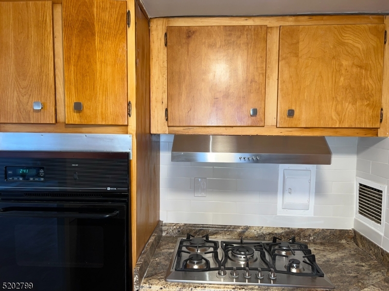 NEW STOVE TOP AND HOOD WITH WALL OVEN