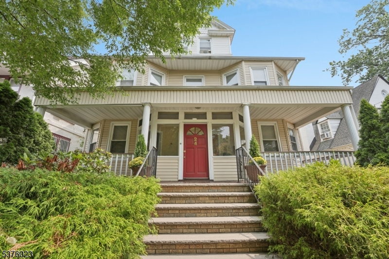 Great Curb Appeal with a beautiful wrap around porch