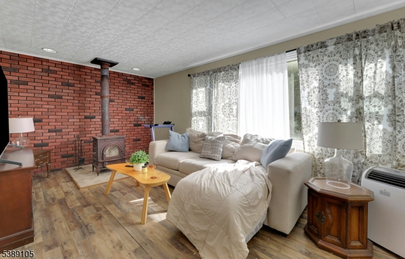 Living Room Cozy up by your own wood-burning stove...