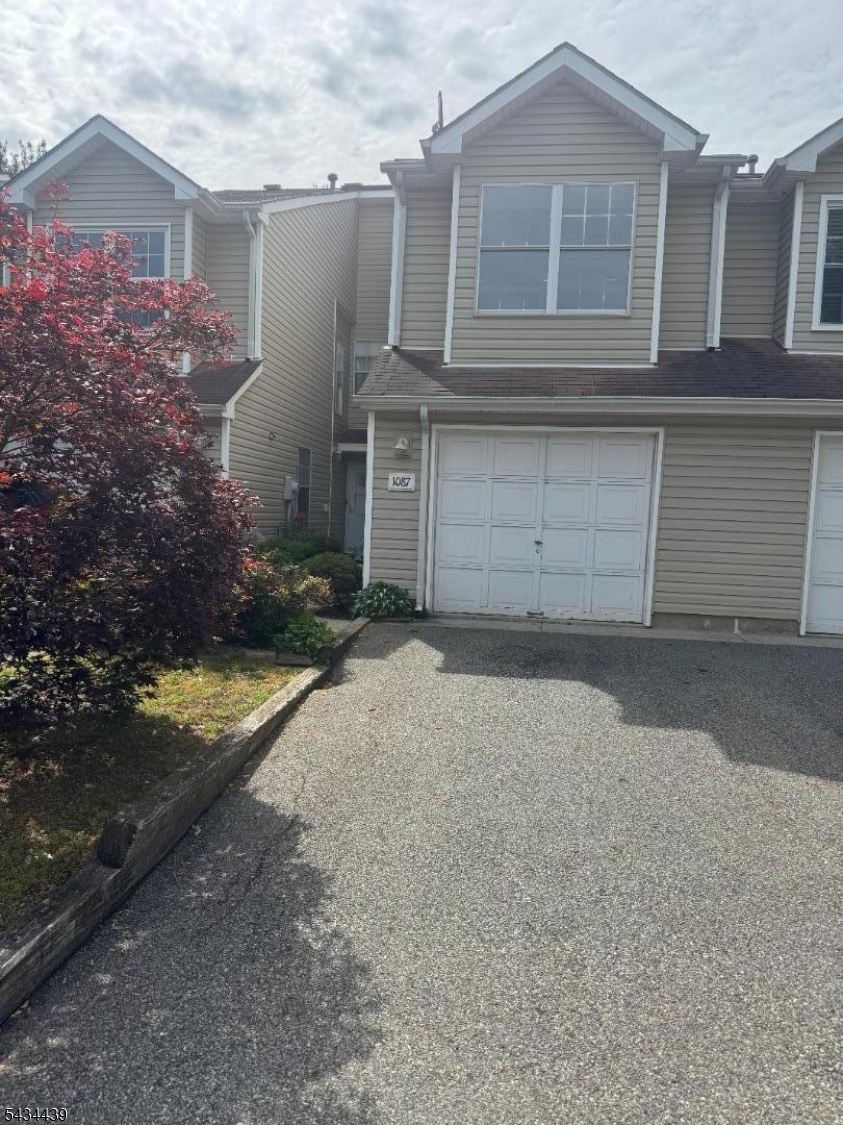 Front View Welcome home to this beautifully maintained multi-floor condo in the sought-after Forest Gate Community.