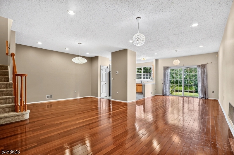 Gorgeous wood floors! Sliders to rear patio and yard Designer Lighting Fixtures