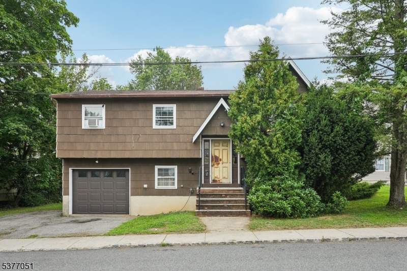 Welcome home to this charming 3 bedroom 1.5 bathroom Bi-Level offering both privacy and potential.