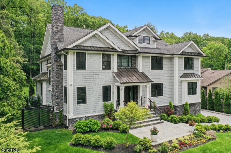 Modern and sophisticated custom home completed in 2021. Thoughtfully designed with high end finishes, soaring ceilings and seamless indoor and outdoor living.