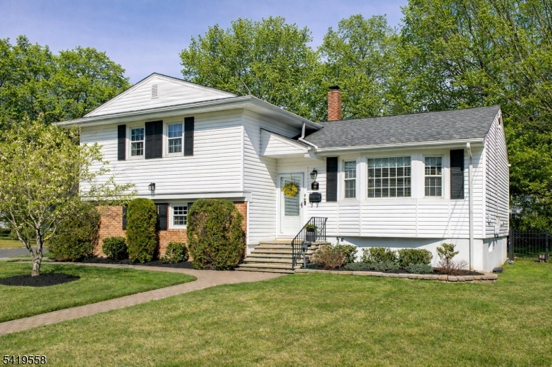 Front of Home Photo digitally enhanced for summer foliage