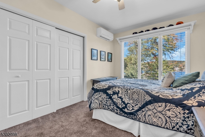 2nd bed rm w/2 closets Two separate side by side closets, carpet, ceiling ran, new mini split.