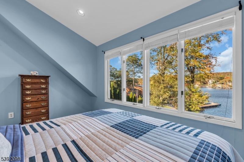 4th bedrm, 2nd floor Wall to wall carpet, walk-in closet, Fan/light combo and mini split.