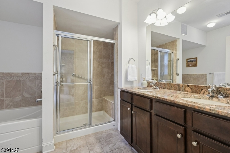 . Primary bath with separate shower and tub.