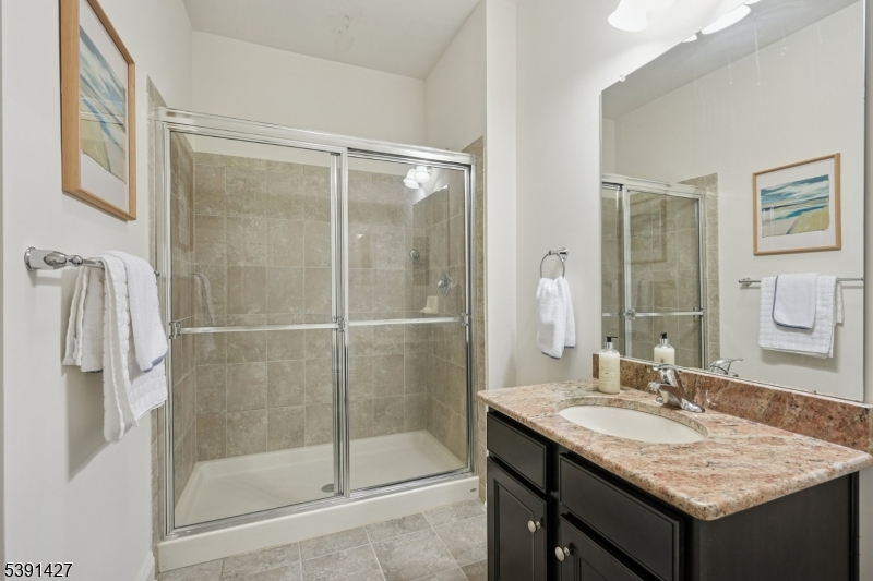 . Hall bath with step in shower.