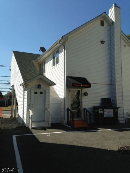 rear entrance and parking