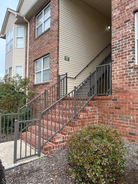 Front Entrance - 17 Frankie Ln Door to unit is on the left side under the staircase.