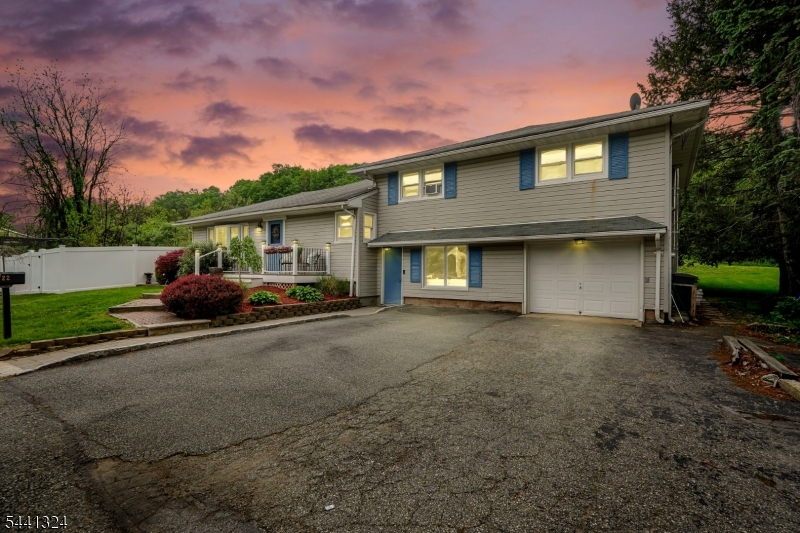 Nestled in desirable Pompton Lakes, this charming 4-bedroom split-level offers space, character, and great entertaining opportunities both inside and out.
