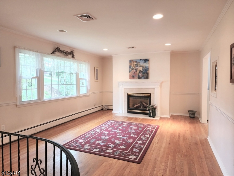 Wood floors and a Gas fireplace