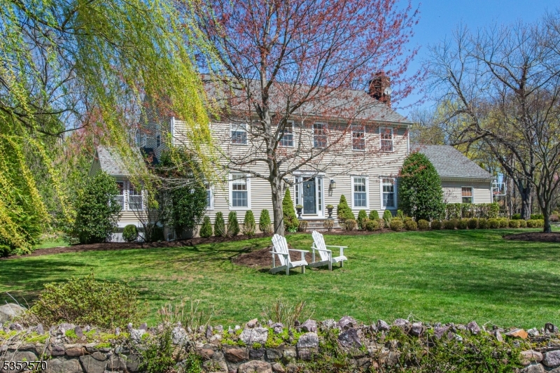 Set in an ideal center of town location, this pristine, custom colonial awaits!