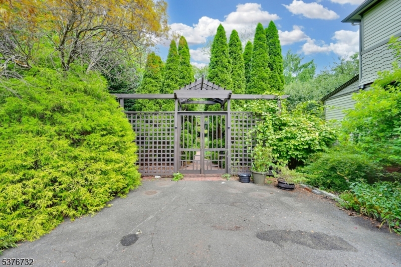 Driveway leads to Front walkway