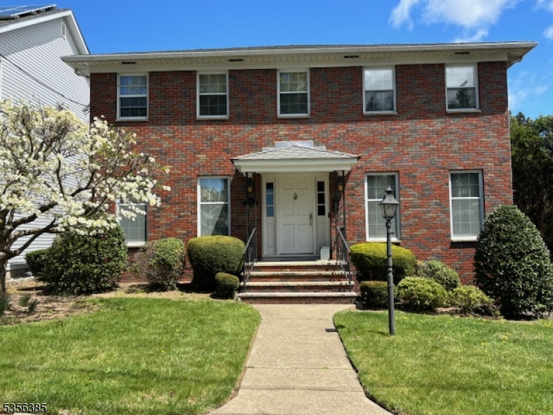All Brick Center Hall Colonial