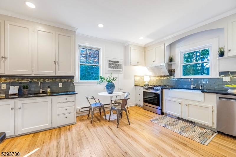 Kitchen  15'-3 Refinished floors + newly painted