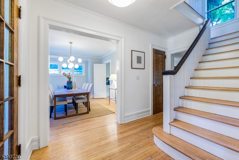 Center Entry Hall Refinished floors + newly painted