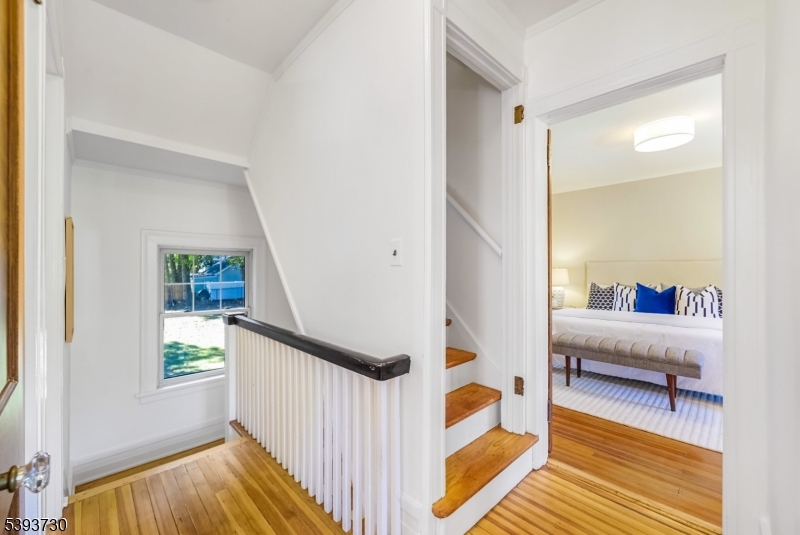 2nd floor landing Refinished floors + newly painted