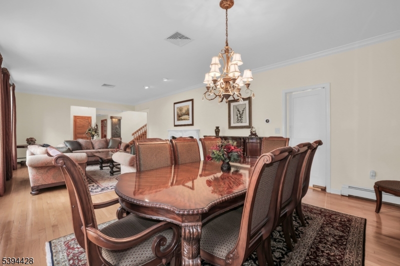 Formal Dining Room Open to formal living room. Swing door to eat-in kitchen.