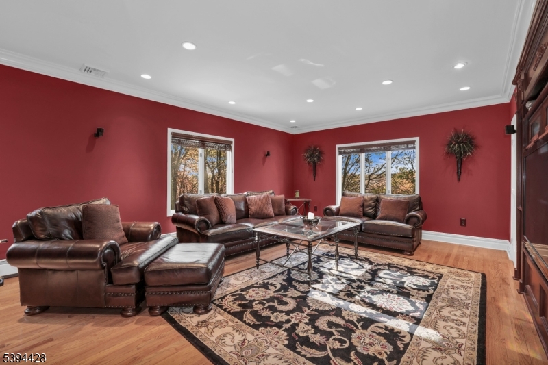 1st Floor Leisure Room Wood floors, crown molding, recessed lighting.