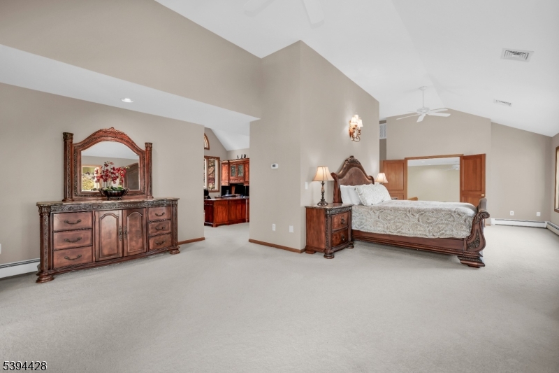 Primary Sitting Area View to office and walk-in closets