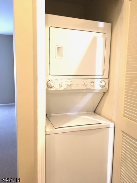 In Unit Laundry Doing laundry will be easy with this stackable washer and dryer in the unit.