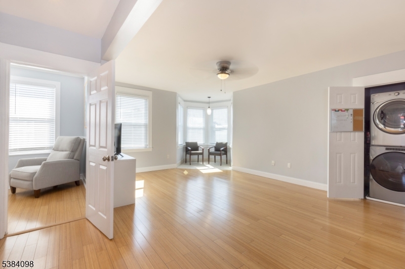 Living room w/ Washer & Dryer