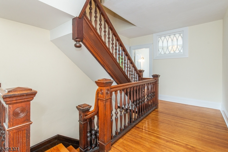 2nd floor hallway Beautiful floating staircase!