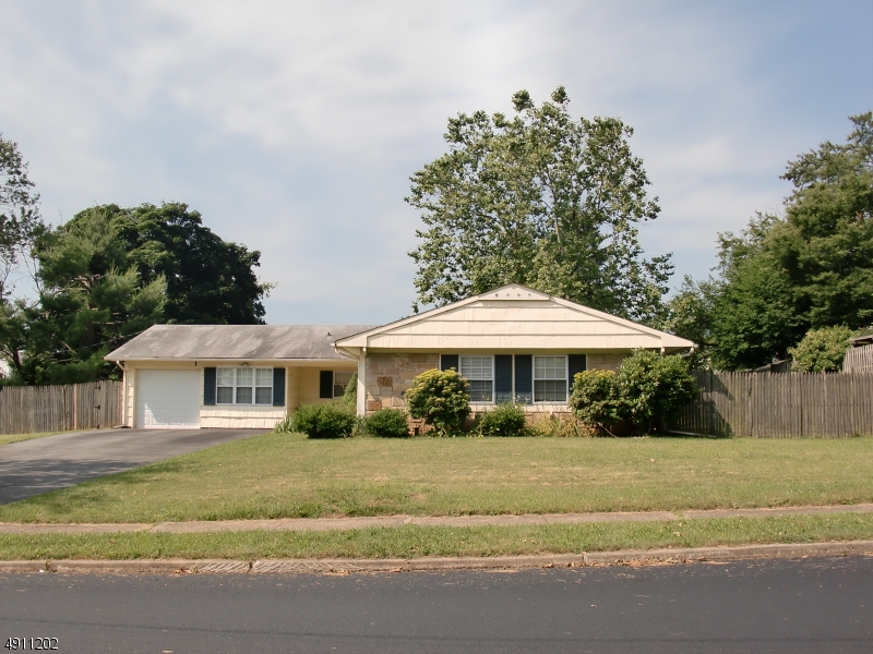 Three bedroom 2 full bath ranch with one car attached garage and 2 car wide driveway for off street parking.