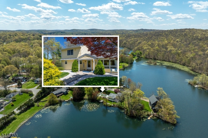 Located on a Peninsula! Water views in every bedroom!!