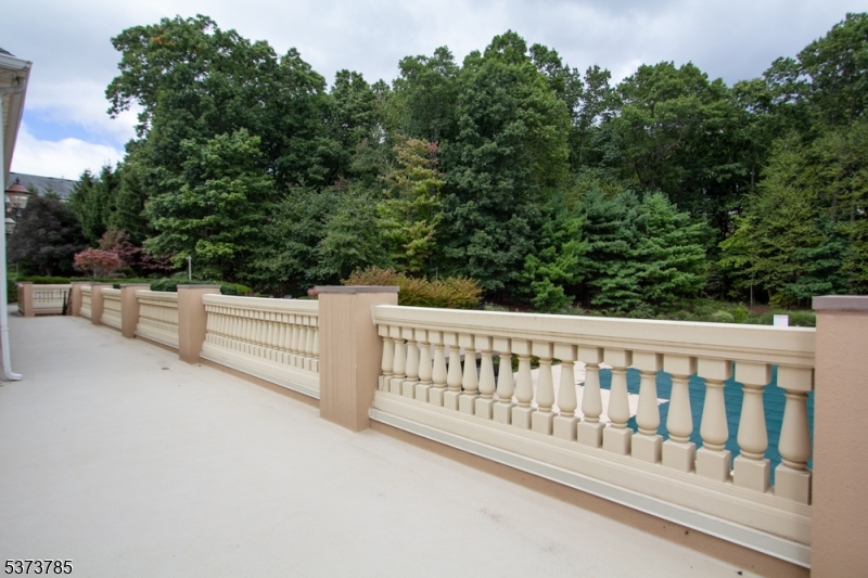 Clubhouse patio overlooks pool