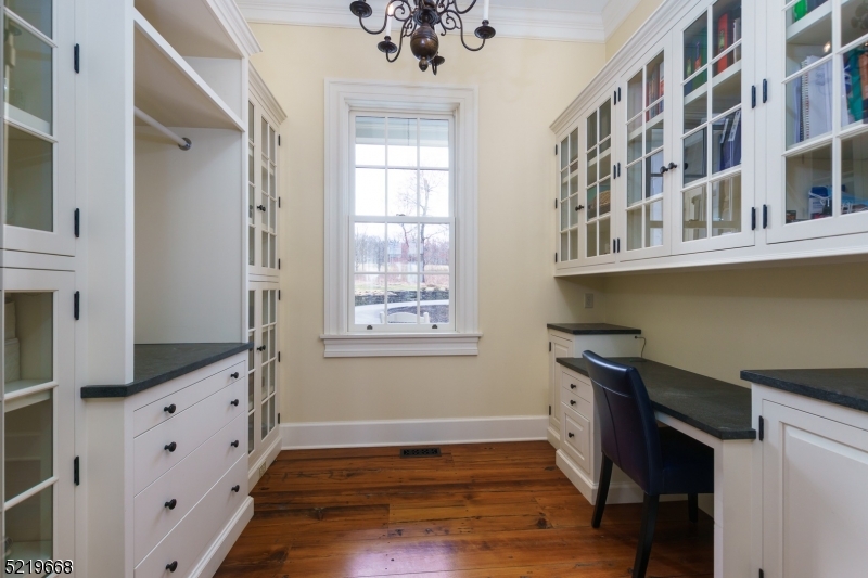 Glass Cabinetry Pantry with Compact Office Space