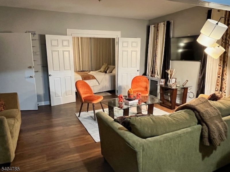 Spacious, fully furnished living area designed for immediate move-in comfort.