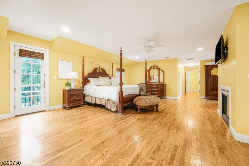 Primary Suite Spacious, Loads of Closets, Gas Burning Fireplace and Balcony overlooking backyard, and more.