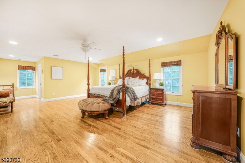 Primary Suite Spacious, Loads of Closets, Gas Burning Fireplace and Balcony overlooking backyard, and more.