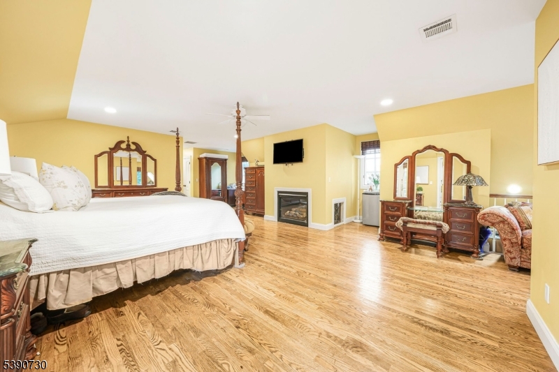 Primary En Suite Spacious, Loads of Closets, Gas Burning Fireplace and Balcony overlooking backyard, and more.