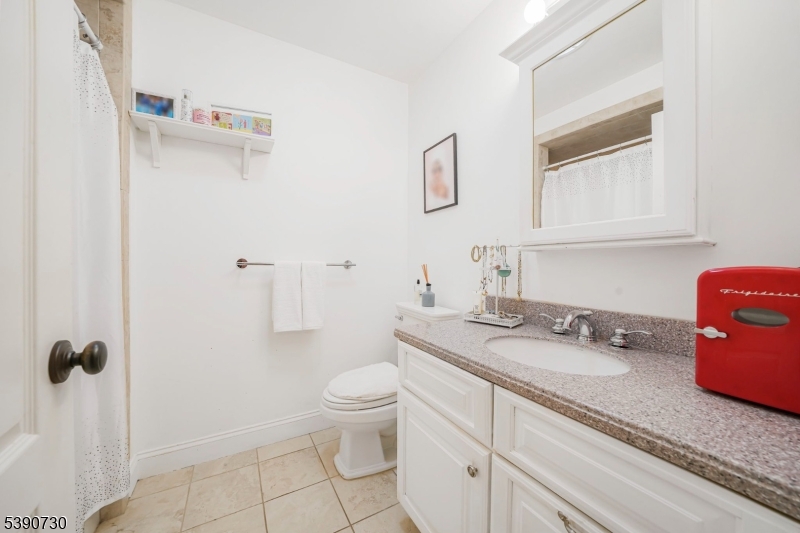 Bedroom #2, Ensuite Equipped with WIC, HW Floors and own Updated Bathroom