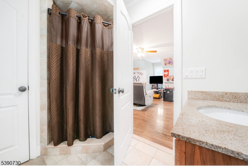 Bedroom #3, Ensuite Equipped with WIC, HW Floors and own Updated Bathroom
