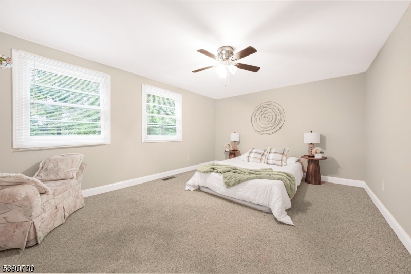 Above Garage Getaway Living space, kitchenette, main bath, bedrooms, closets galore , balcony plus access to main house or private entrance from side yard.
